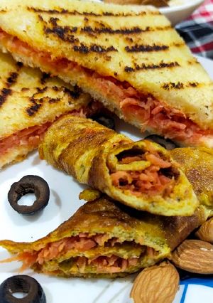 A picture of Crispy carrot bread sandwich & carrot egg rolls.