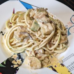 A picture of Courgette spaghetti in cream sauce - gluten free, spiralized veg.