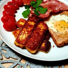 A picture of Halloumi egg in a hole breakfast.
