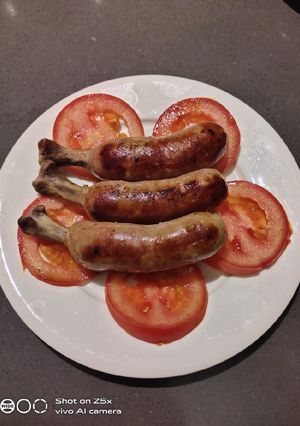 A picture of Pork Sausage with Tomato.
