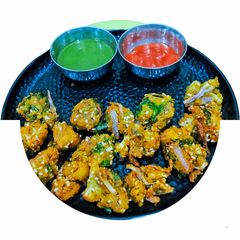 Crispy Cauliflower Sesamey Pakoda A picture of Crispy Cauliflower Sesamey Pakoda.