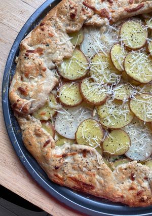 A picture of Leftover potato, cheese and onion galette.