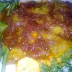 A picture of Spicy tawa khandvi.