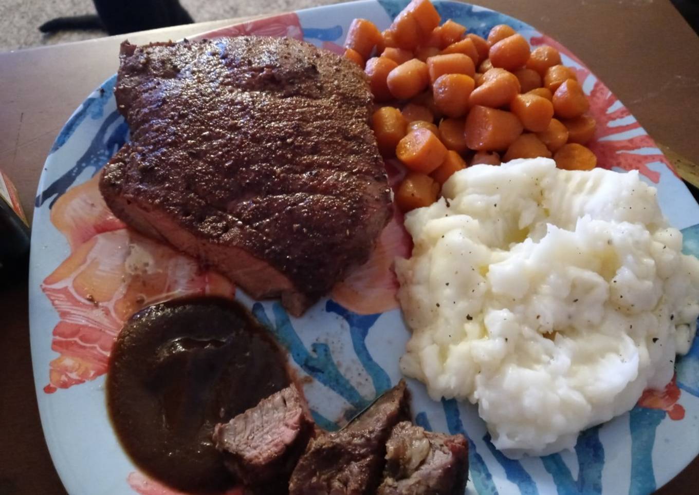 Spicy Swiss steak with glazed carrots and mashed potatoes