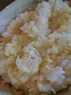 Una foto de Arroz con queso y huevo duro
