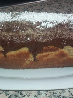 Una foto de Bizcocho de mandarina y ganache de chocolate