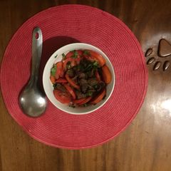 A picture of Raw tomato meat stew.