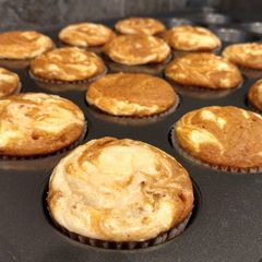 A picture of Pumpkin Cream Cheese Muffins.