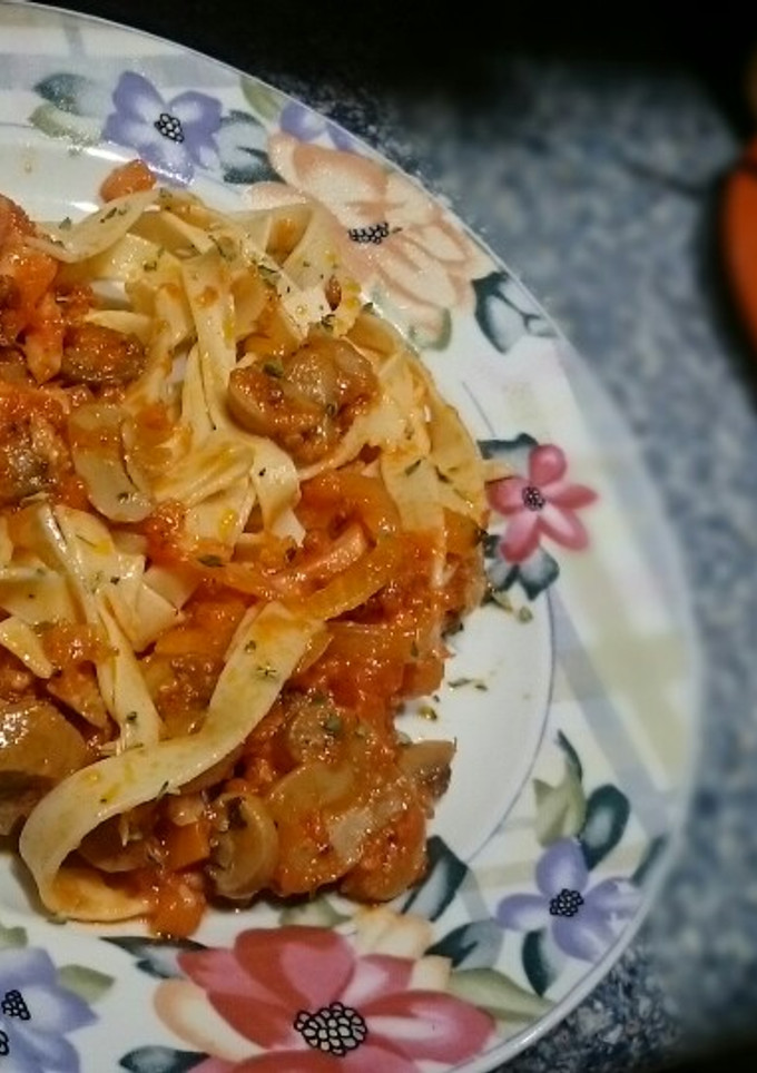 Una foto de Tagliatelle con Champiñones y Bacon