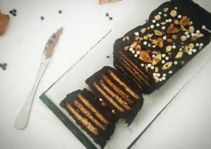 Recipe of Perfect Chocolate Biscuit Cake with Sugar coated Coconut Biscuits
