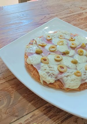 Una foto de Tortilla de fideos a la pizza 🍝