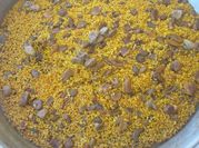 Una foto de paella pato