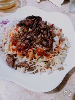 صورة لوصفة الكشري المصري 🍅