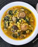 Arroz caldoso con setas, espinacas y habas