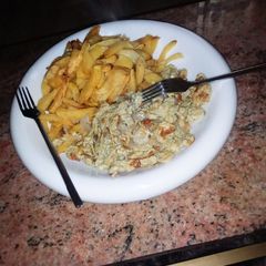 A picture of Irish potatoe with scrambled egg.
