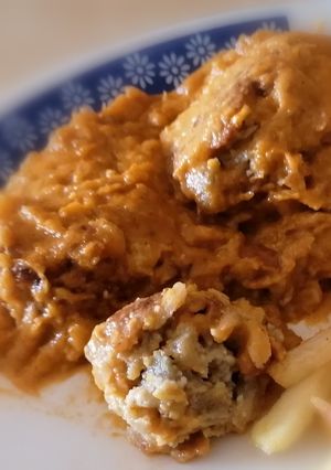 Una foto de Albóndigas de berenjena en salsa de tomate