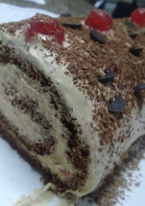Una foto de Arrollado de chocolate y café, súper fácil