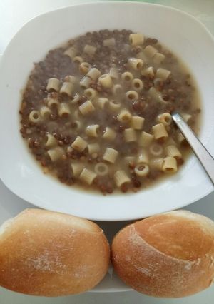 A picture of Pasta and lentil soup.