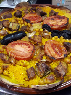Una foto de Arros al forn (Arroz al horno a la valenciana)