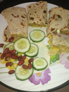 A picture of My homemade shawama stuffed with shredded chicken.
