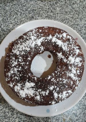 Una foto de Bizcochuelo de naranja y manzana;con azúcar mascabo