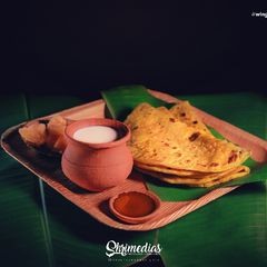 A picture of HOLIGE (“ Obbattu /Sweet stuffed soft indanbread“ _in north karn.