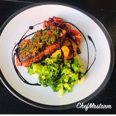 Charred Salmon Fillet with Tomato+Onion Relish Potatoes and Blanched Broccoli A picture of Charred Salmon Fillet with Tomato+Onion Relish Potatoes and Blanched Broccoli.