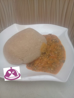 A picture of Eba with g/nut soup.