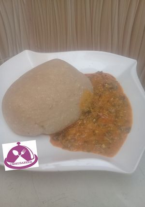 A picture of Eba with g/nut soup.