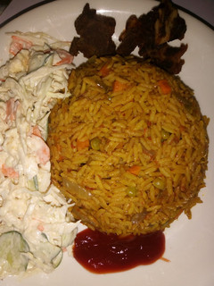 A picture of Fried Rice with Salad.