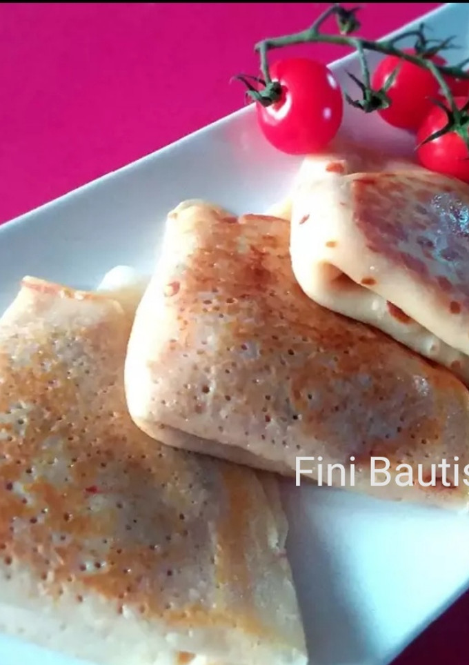 Una foto de Crepes rellenos de queso y jamón york
