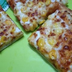 A picture of Corn pizza.