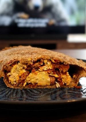 Una foto de Empanada rústica de calabacín, cebolla dulce y Jamón de Teruel en costra integral