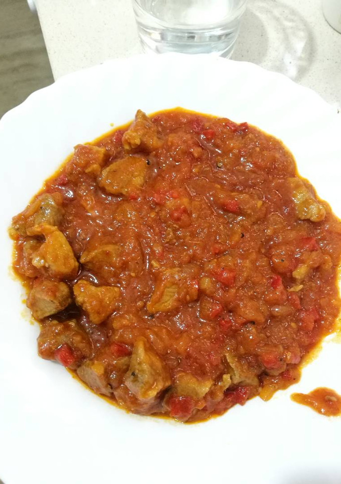 Una foto de Magra con tomate