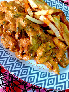 Una foto de Tiras de Pechuga de pollo tandoori masala powder y curry verde