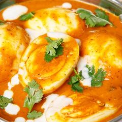 A picture of Aloo or paneer ki egg curry.