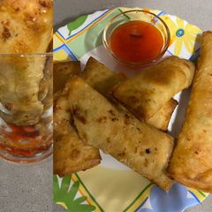 A picture of Cigar roll with sweet chilli sauce.