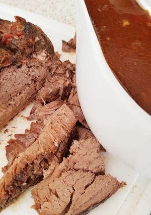A picture of My Slow Cooked Beef in a little spicy mix with a lovely Sauce.