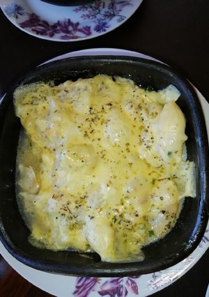 Una foto de Machas a la Parmesana