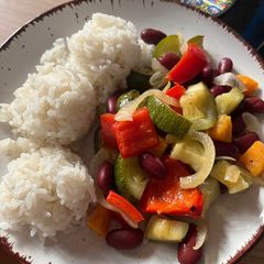 A picture of Roasted Veggies with Rice and Beans.