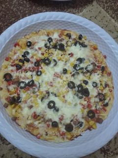 صورة لوصفة بيتزا 😋