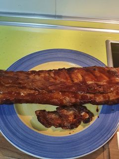 Una foto de Costillar al horno en salsa bbq!! Tipo Foster's