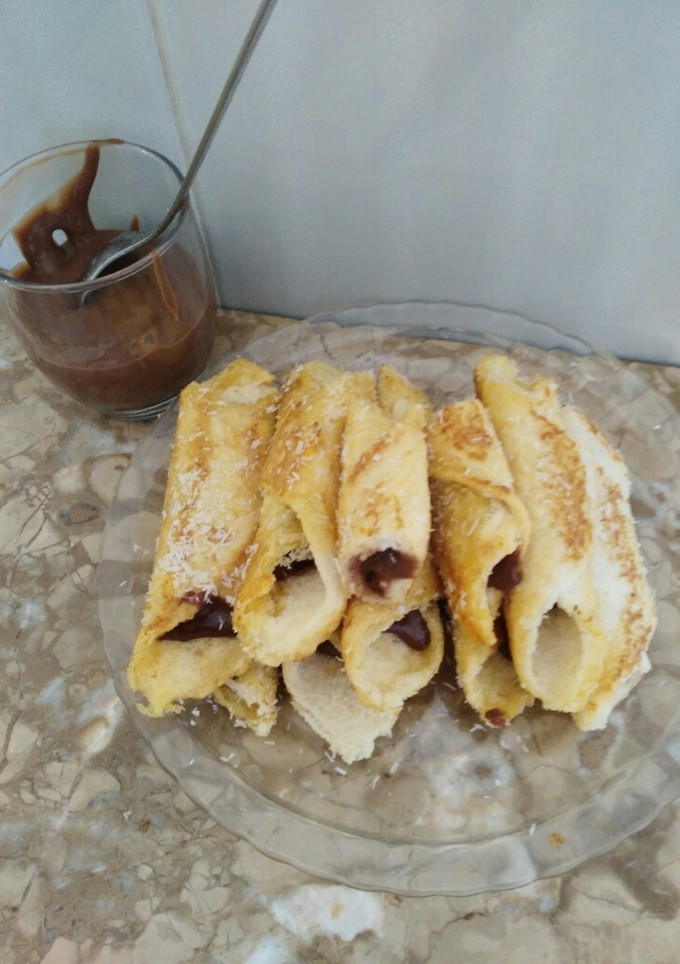 Una foto de Rollitos de Pan de molde relleno de chocolate casero sin azúcar