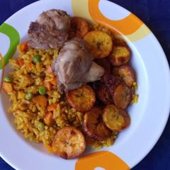 Jollof rice with fried plantain A picture of Jollof rice with fried plantain.