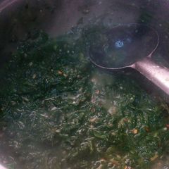 A picture of Sarson da saag te missi Roti (Jain).