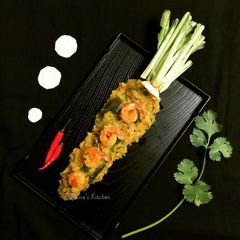 A picture of Mulo Chingri Chechki Radish Prawn Stir Fry Bengali style.