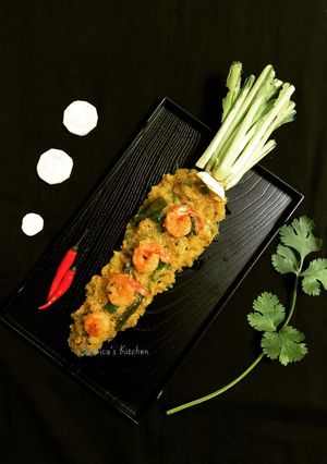 A picture of Mulo Chingri Chechki Radish Prawn Stir Fry Bengali style.