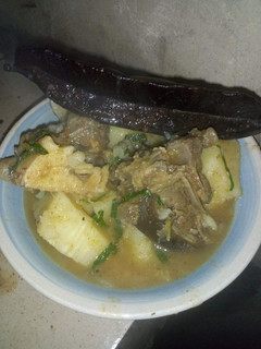 A picture of Goat meat yam pepper soup.
