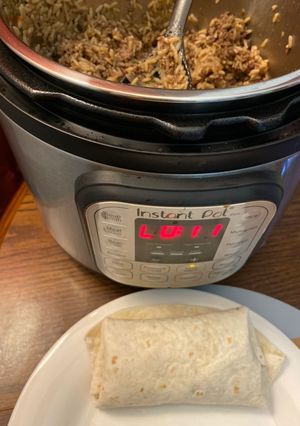 A picture of Instant pot rice & meat burritos 🌯.