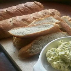 A picture of Homemade Baguettes with Garlic Dill Butter.